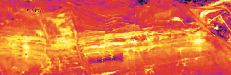 Obr. 12: Teplotní jevy způsobené podzemní vodou pozorované na stěně velkolomu